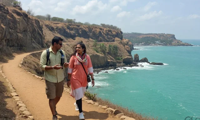 Couple walking a coastal cliff path