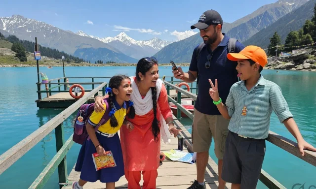 Family with school-age kids at an alpine lake